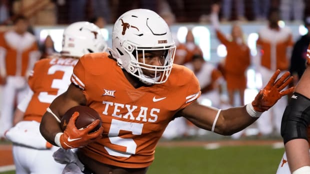 Nov 12, 2022; Austin, Texas, USA; Texas Longhorns running back Bijan Robinson (5) runs for yards during the first half against the Texas Christian Horned Frogs at Darrell K Royal-Texas Memorial Stadium. Mandatory Credit: Scott Wachter-USA TODAY Sports
